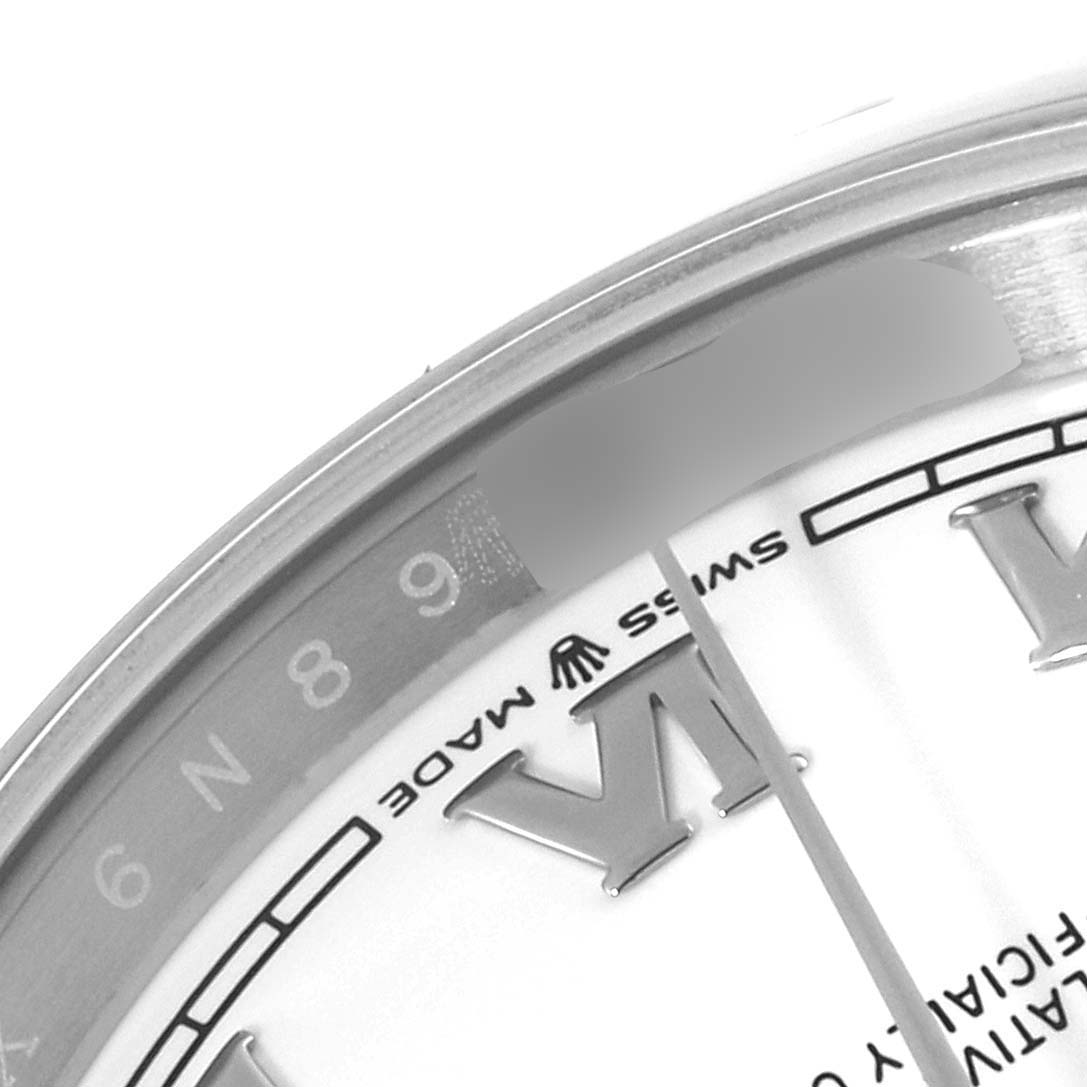 This is a close-up angle showing part of the dial and the edge of a Rolex Datejust 126200 Men's Stainless Steel White Dial 126200 Men's Stainless Steel White Dial watch, highlighting the Roman numeral "VI."
