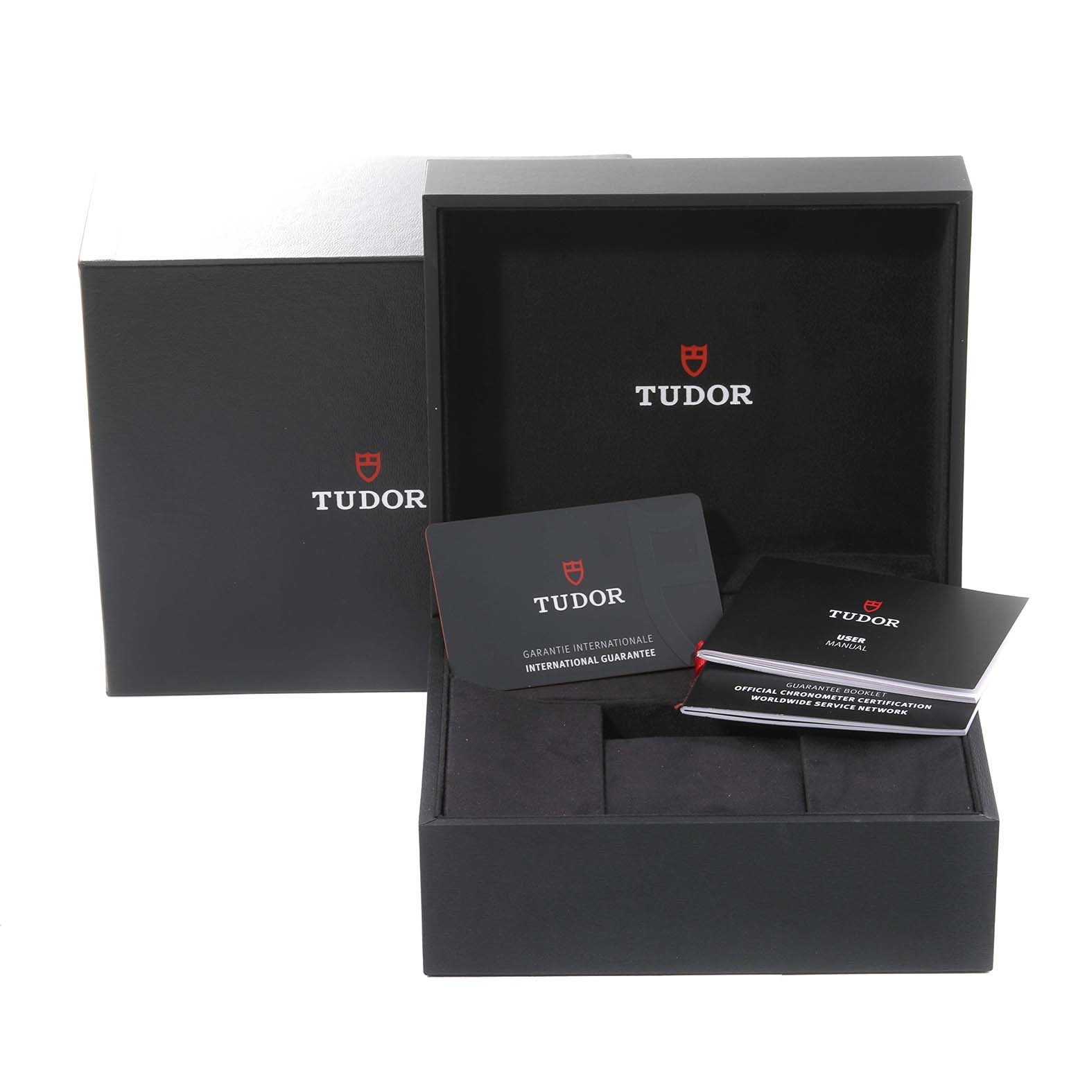 The image shows the packaging, international guarantee card, and user manual for the Tudor Heritage Black Bay 7941A1A0RU Men's Stainless Steel Black Dial 7941A1A0RU Men's Stainless Steel Black Dial watch model.