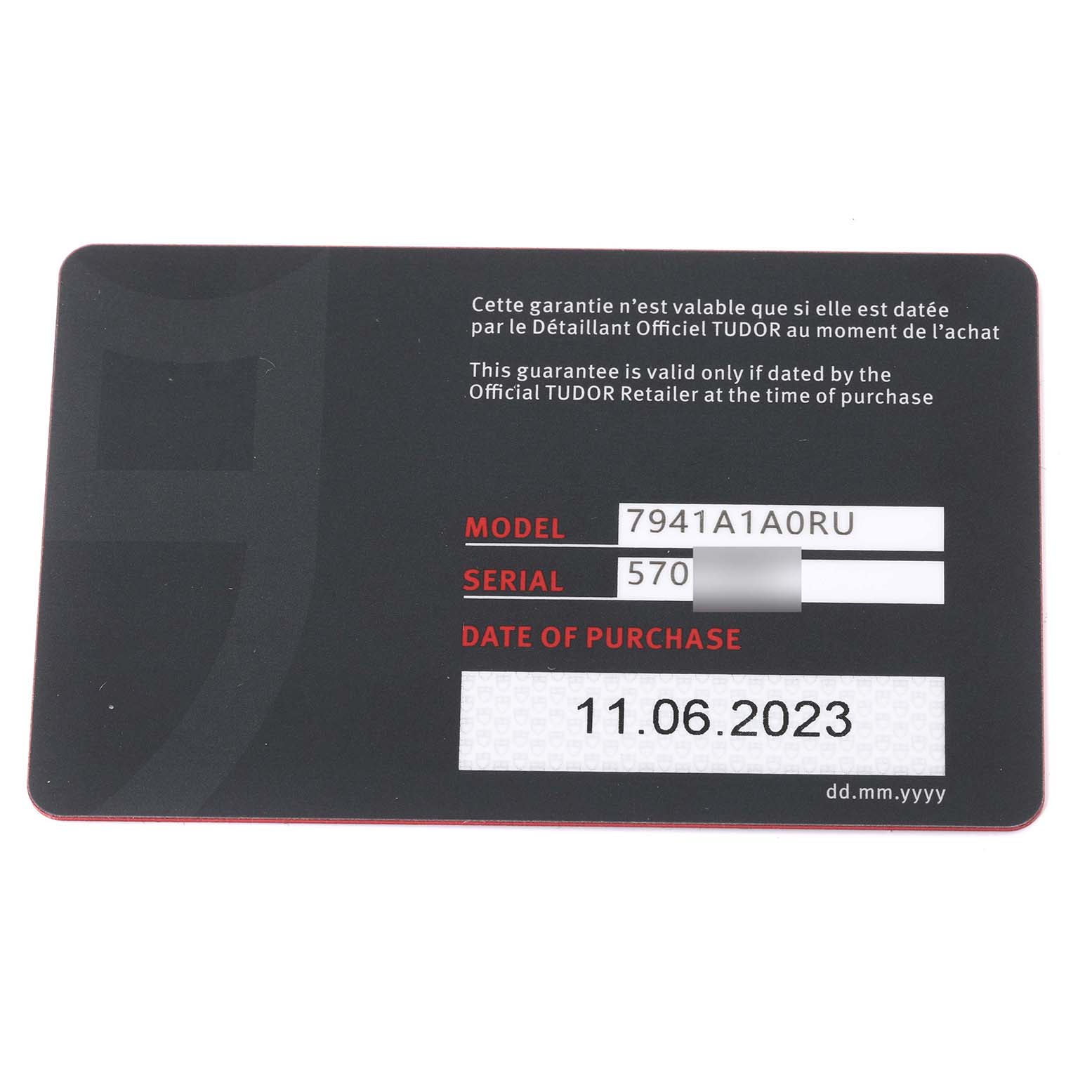 This image shows the warranty card for the Tudor Heritage Black Bay 7941A1A0RU Men's Stainless Steel Black Dial 7941A1A0RU Men's Stainless Steel Black Dial watch, displaying the model, serial number, and purchase date.