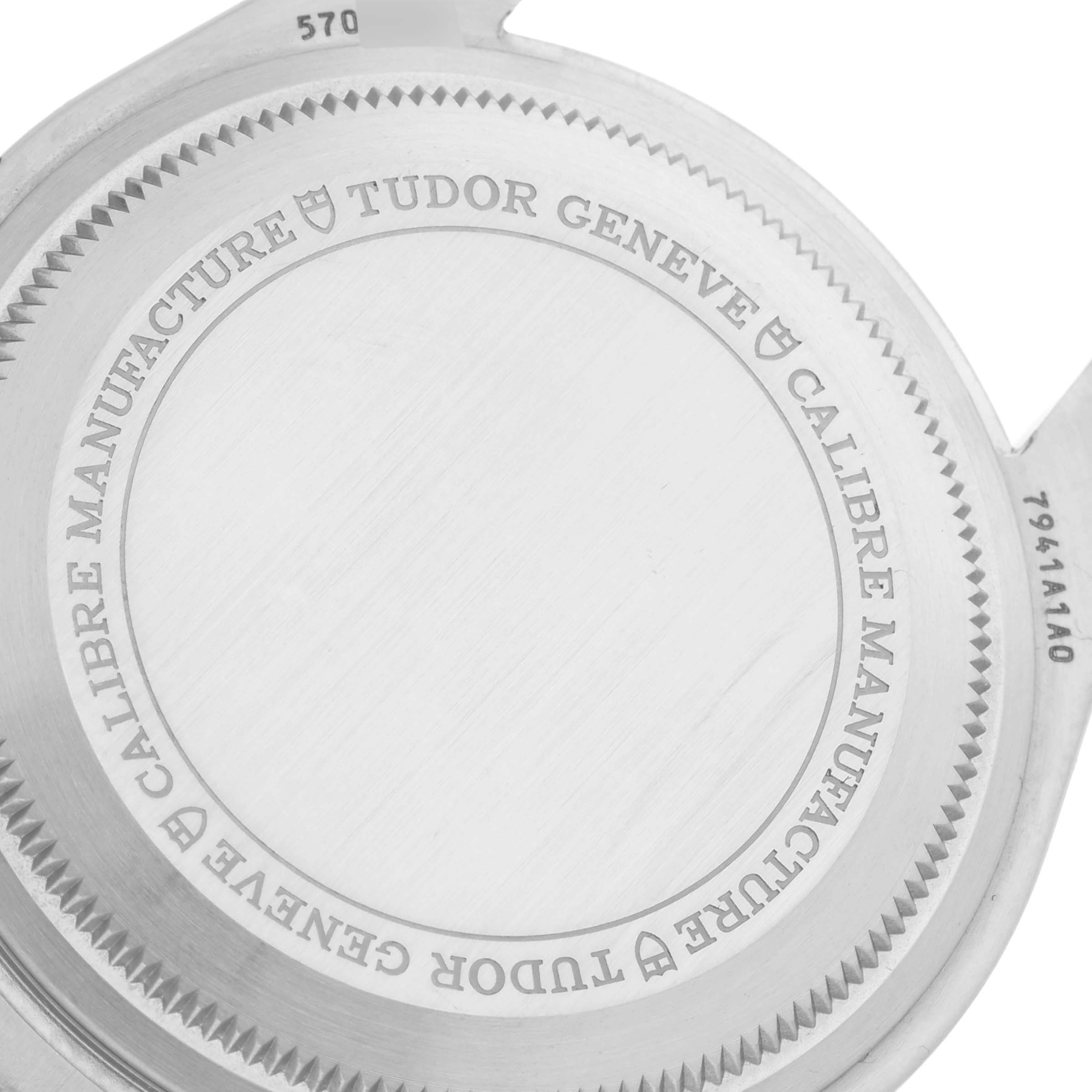 This image shows the back case of a Tudor Heritage Black Bay 7941A1A0RU Men's Stainless Steel Black Dial 7941A1A0RU Men's Stainless Steel Black Dial watch, displaying its engravings and details.