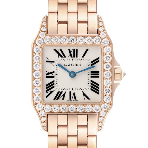 The Cartier Santos Demoiselle WF9007Z8 Women's Rose Gold Silver Dial WF9007Z8 Women's Rose Gold Silver Dial watch is shown from the front, featuring a diamond-encrusted bezel and gold bracelet.