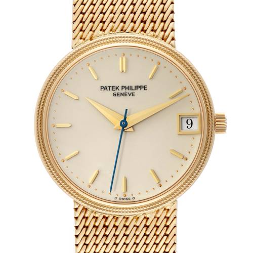 The image shows a close-up of the Patek Philippe Calatrava 3802 Men's Yellow Gold White Dial 3802 Men's Yellow Gold White Dial watch face, highlighting the dial, hands, date window, and crown.