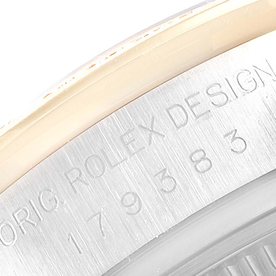 This image shows a close-up of the serial number engraving on the case of a Rolex Datejust 179383 Women's Steel and Gold (two tone) Mother of Pearl Dial 179383 Women's Steel and Gold (two tone) Mother of Pearl Dial watch.