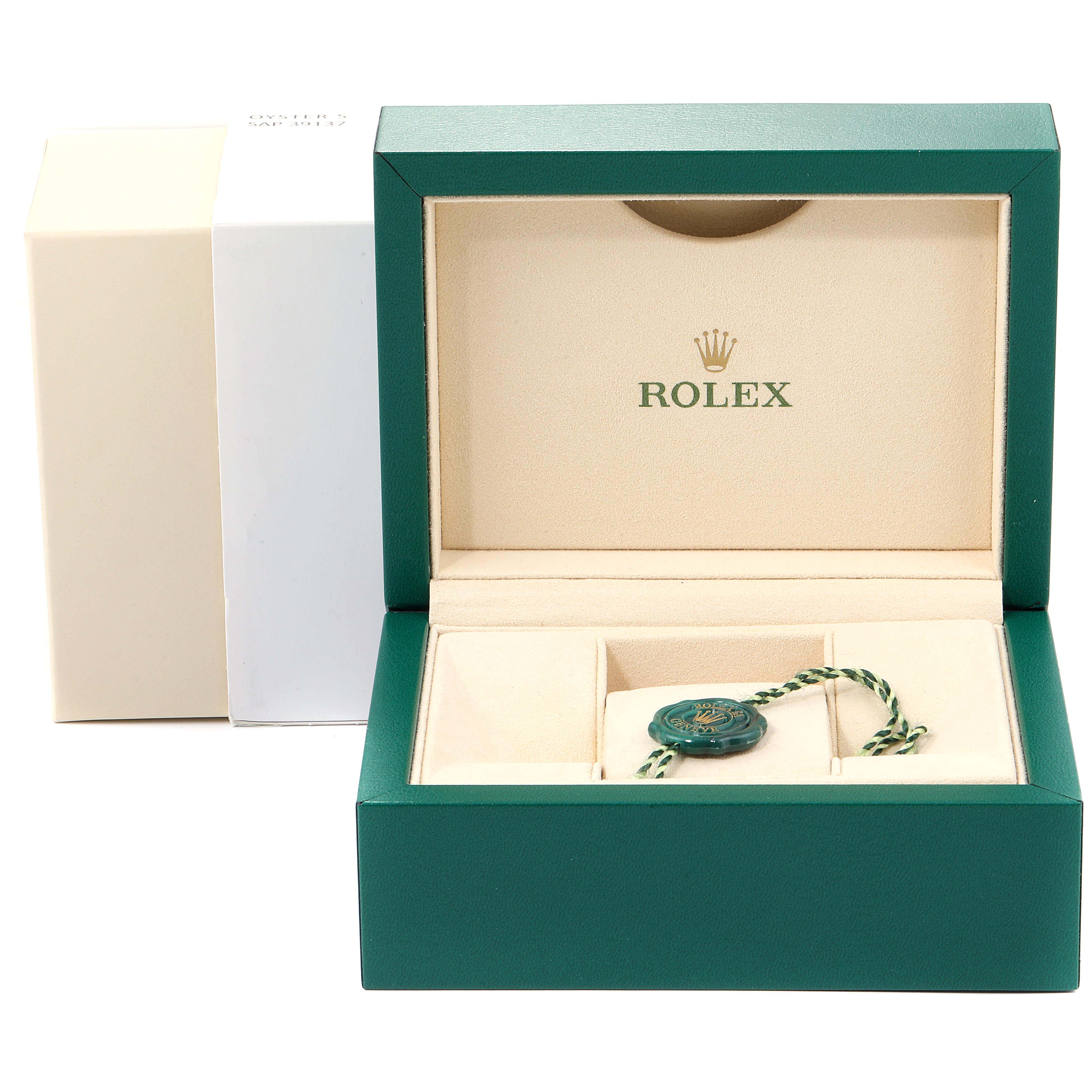 The image shows an empty green Rolex Datejust 179383 Women's Steel and Gold (two tone) Mother of Pearl Dial 179383 Women's Steel and Gold (two tone) Mother of Pearl Dial watch box with a green and white tag inside.