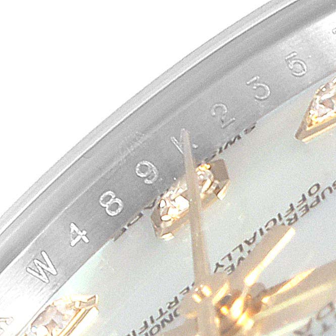 This image shows a close-up of the partial dial and gold hour markers of a Rolex Datejust 179383 Women's Steel and Gold (two tone) Mother of Pearl Dial 179383 Women's Steel and Gold (two tone) Mother of Pearl Dial watch.