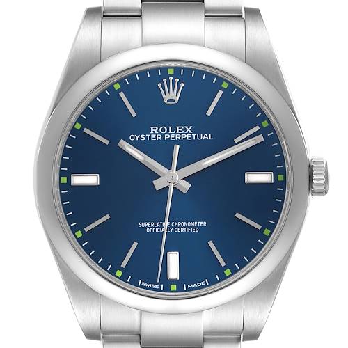 The image shows a Rolex Oyster Perpetual 114300 Men's Stainless Steel Blue Dial 114300 Men's Stainless Steel Blue Dial watch face from a front angle, highlighting the blue dial and silver markers.