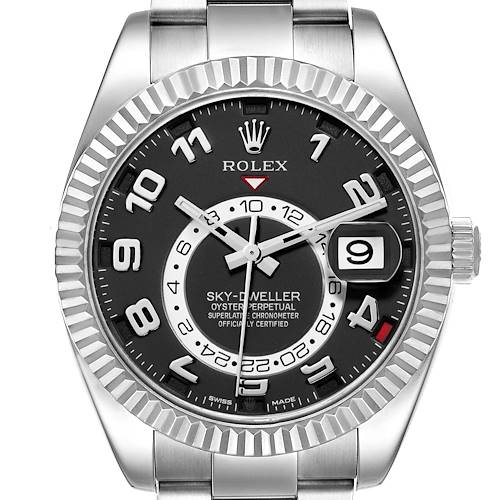 The Rolex Sky-Dweller 326939 Men's White Gold Black Dial 326939 Men's White Gold Black Dial watch is shown from a front angle, highlighting its black dial, fluted bezel, and date window.
