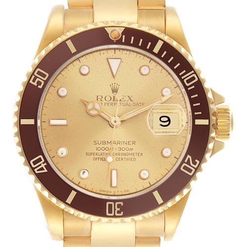 The Rolex Submariner 16618 Men's Yellow Gold Champagne Dial 16618 Men's Yellow Gold Champagne Dial is shown from the front, highlighting the dial, bezel, and part of the bracelet with a visible date window.