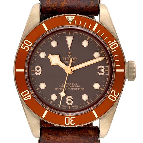 The image shows the Tudor Heritage Black Bay 79250B Men's Bronze Brown Dial 79250B Men's Bronze Brown Dial watch from a front angle, highlighting its dial, bezel, and part of the leather strap.