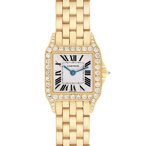 The Cartier Santos Demoiselle WF9001Y7 Women's Yellow Gold Silver Dial WF9001Y7 Women's Yellow Gold Silver Dial watch is shown from a front angle, highlighting its gold and diamond-set square face and bracelet.