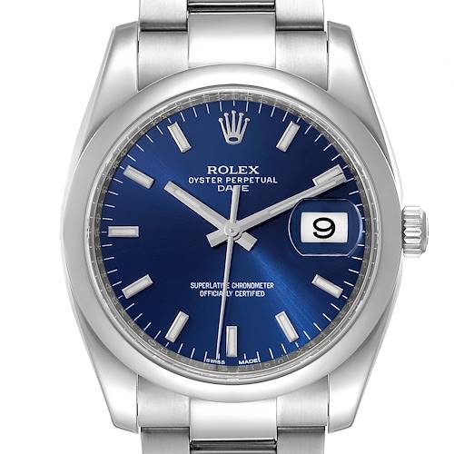 The image shows the front view of a Rolex Oyster Perpetual Date watch, featuring its blue dial, hands, date window, and part of the bracelet.