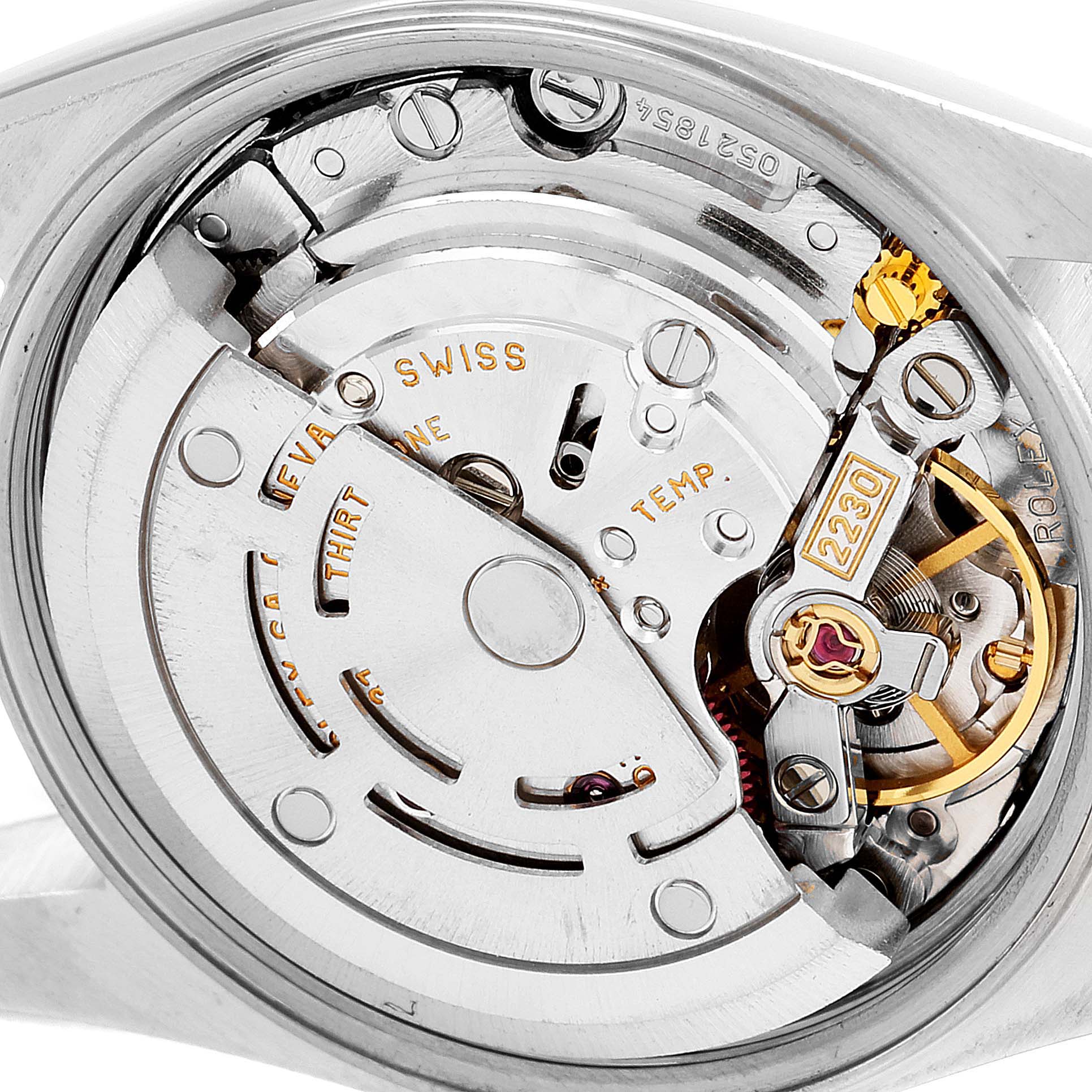 This is a close-up view of the movement mechanism inside a Rolex Oyster Perpetual 76030 Women's Stainless Steel White Dial 76030 Women's Stainless Steel White Dial watch.