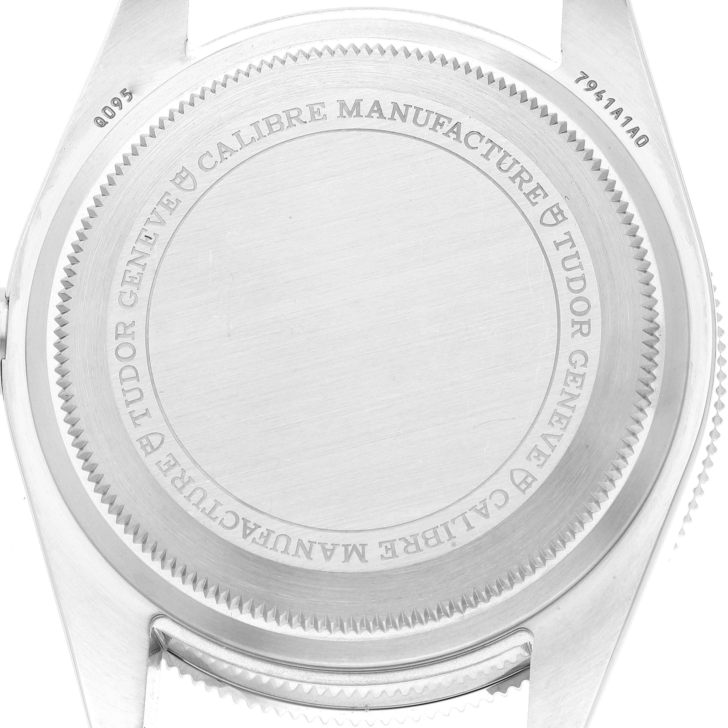 The image shows the back case of a Tudor Heritage Black Bay M7941A1A0RU-0001 Men's Stainless Steel Black Dial M7941A1A0RU-0001 Men's Stainless Steel Black Dial watch, displaying engravings and case details.