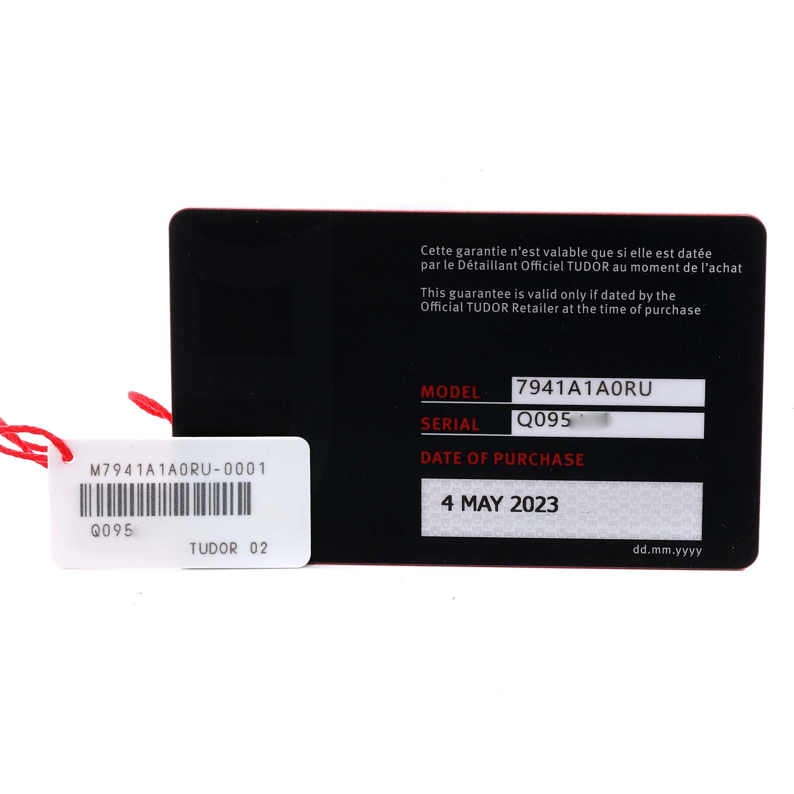 The image shows the warranty card and tag for a Tudor Heritage Black Bay M7941A1A0RU-0001 Men's Stainless Steel Black Dial M7941A1A0RU-0001 Men's Stainless Steel Black Dial model watch, highlighting the model, serial number, and purchase date.