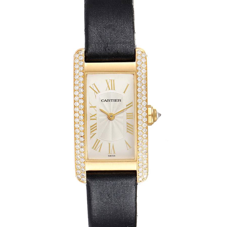 The image shows a Cartier Tank Americaine 1710 Women's Yellow Gold Silver Dial 1710 Women's Yellow Gold Silver Dial watch from a top-down angle, highlighting its rectangular face, diamond bezel, and black leather strap.
