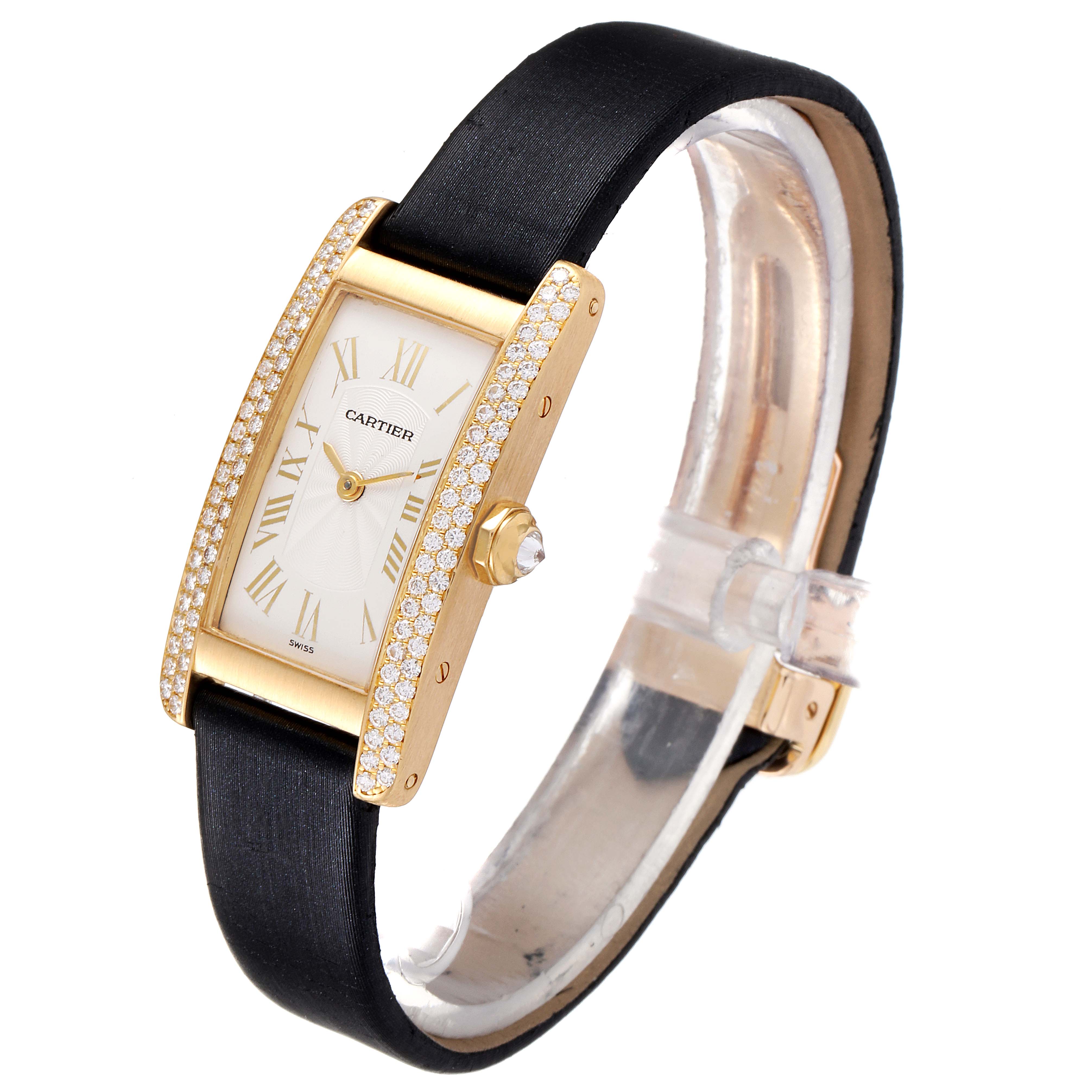 The Cartier Tank Americaine 1710 Women's Yellow Gold Silver Dial 1710 Women's Yellow Gold Silver Dial model is shown from a three-quarter angle, revealing the strap, dial, and diamond-studded case.