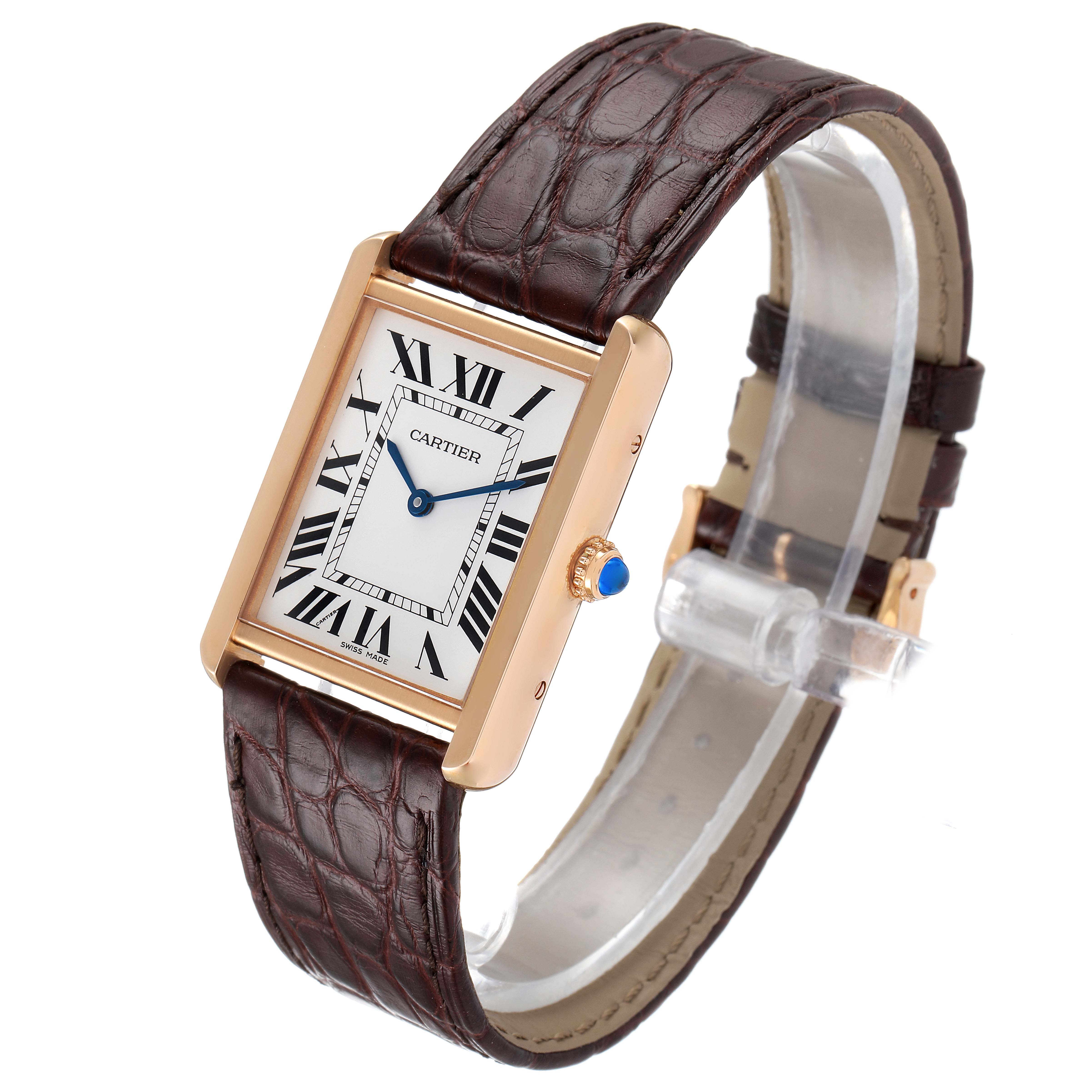 This Tank Solo model by Cartier is shown at a three-quarter angle, highlighting its face, leather strap, and crown.