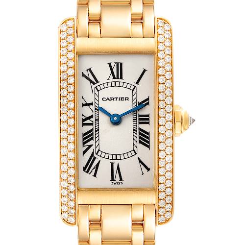 The image shows a top-down view of a Cartier Tank Américaine watch, highlighting the dial, bezel, crown, and part of the bracelet.