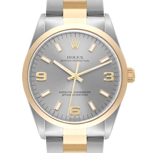 The image shows a frontal view of a Rolex Oyster Perpetual 14203 Men's Steel and Gold (two tone) Grey Dial 14203 Men's Steel and Gold (two tone) Grey Dial watch, highlighting its dial, bezel, and bracelet.