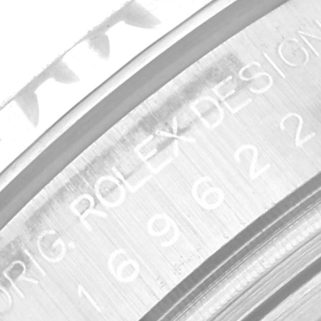 The image shows a close-up angle of the engraving on the case back of a Rolex Yacht-Master 169622 Women's Stainless Steel Silver Dial 169622 Women's Stainless Steel Silver Dial watch.
