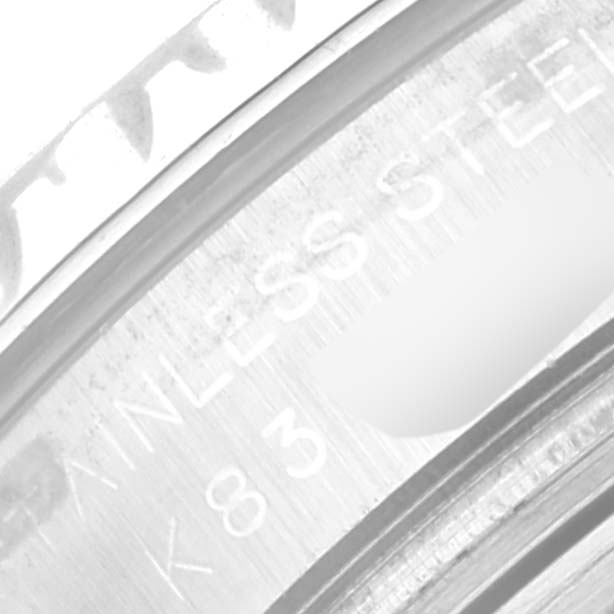 The image shows a close-up angle of the side bezel of a Rolex Yacht-Master 169622 Women's Stainless Steel Silver Dial 169622 Women's Stainless Steel Silver Dial watch, highlighting the engraving details.