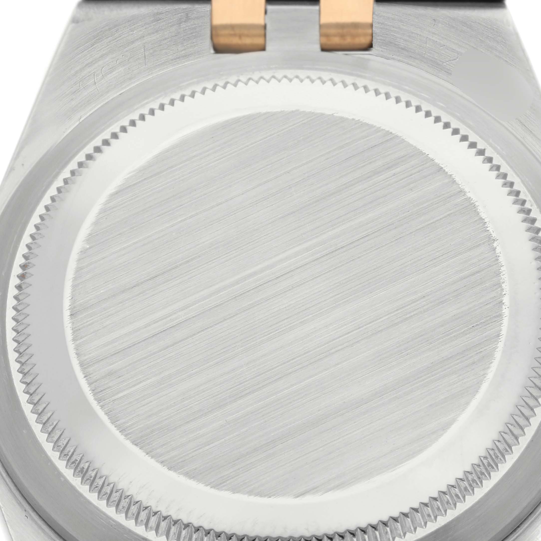 The image shows the case back of a Rolex Oysterquartz 17013 Men's Steel and Gold (two tone) White Dial 17013 Men's Steel and Gold (two tone) White Dial model, viewed from the rear angle with a focus on the screw-down case back.