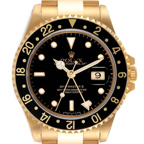 The image shows a front view of a Rolex GMT-Master 16718 Men's Yellow Gold Black Dial 16718 Men's Yellow Gold Black Dial II watch, highlighting the dial, bezel, and bracelet.