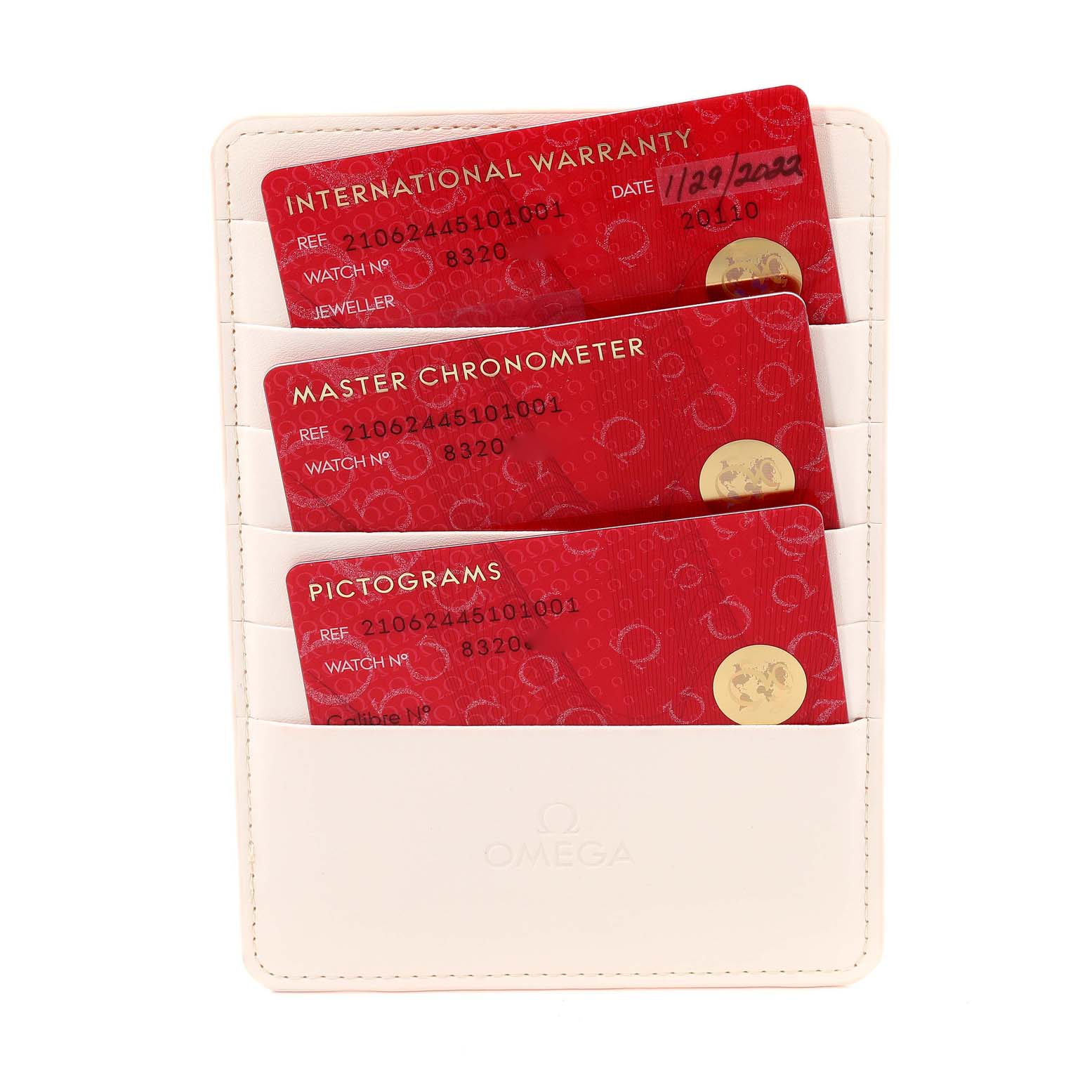 The image shows warranty and certification cards for the Omega Seamaster 210.62.44.51.01.003 Men's Rose Gold Black Dial 210.62.44.51.01.003 Men's Rose Gold Black Dial, displayed in an Omega-branded cardholder.