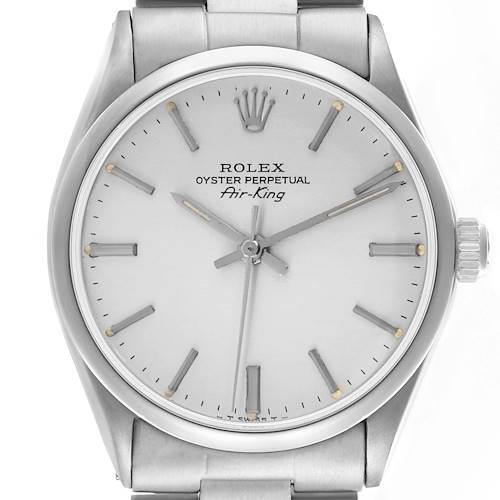 The Rolex Air-King watch is shown from a frontal angle, highlighting its dial, markers, and crown.