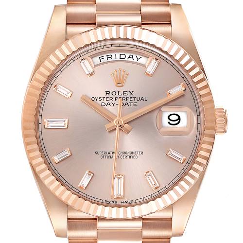 The image shows a frontal view of the Rolex President 228235 Men's Rose Gold Pink Dial 228235 Men's Rose Gold Pink Dial watch, highlighting the dial, day and date windows, bezel, and part of the bracelet.