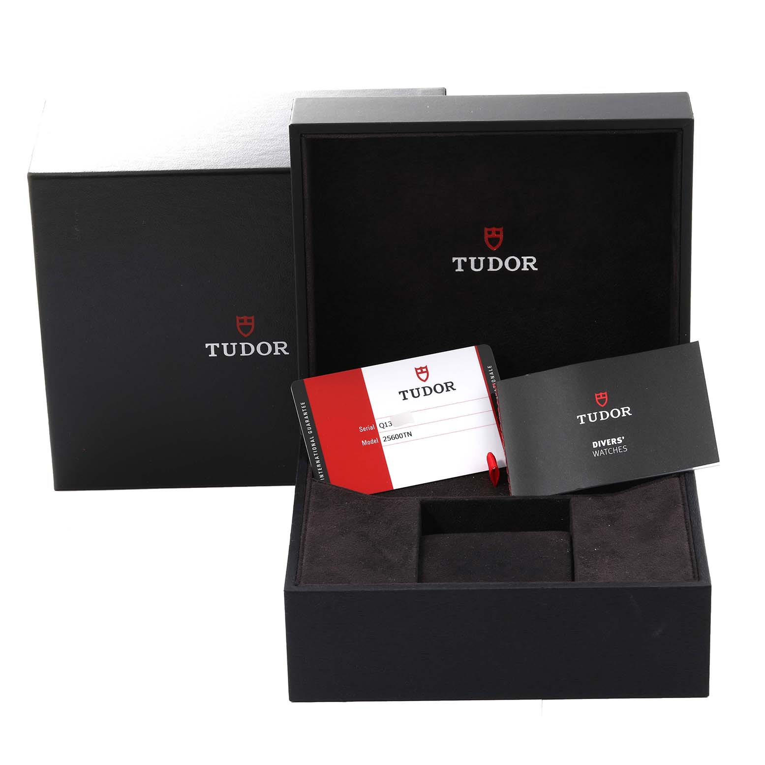 The image shows the open box and warranty card for a Tudor Pelagos 25600TN Men's Titanium Black Dial 25600TN Men's Titanium Black Dial watch.
