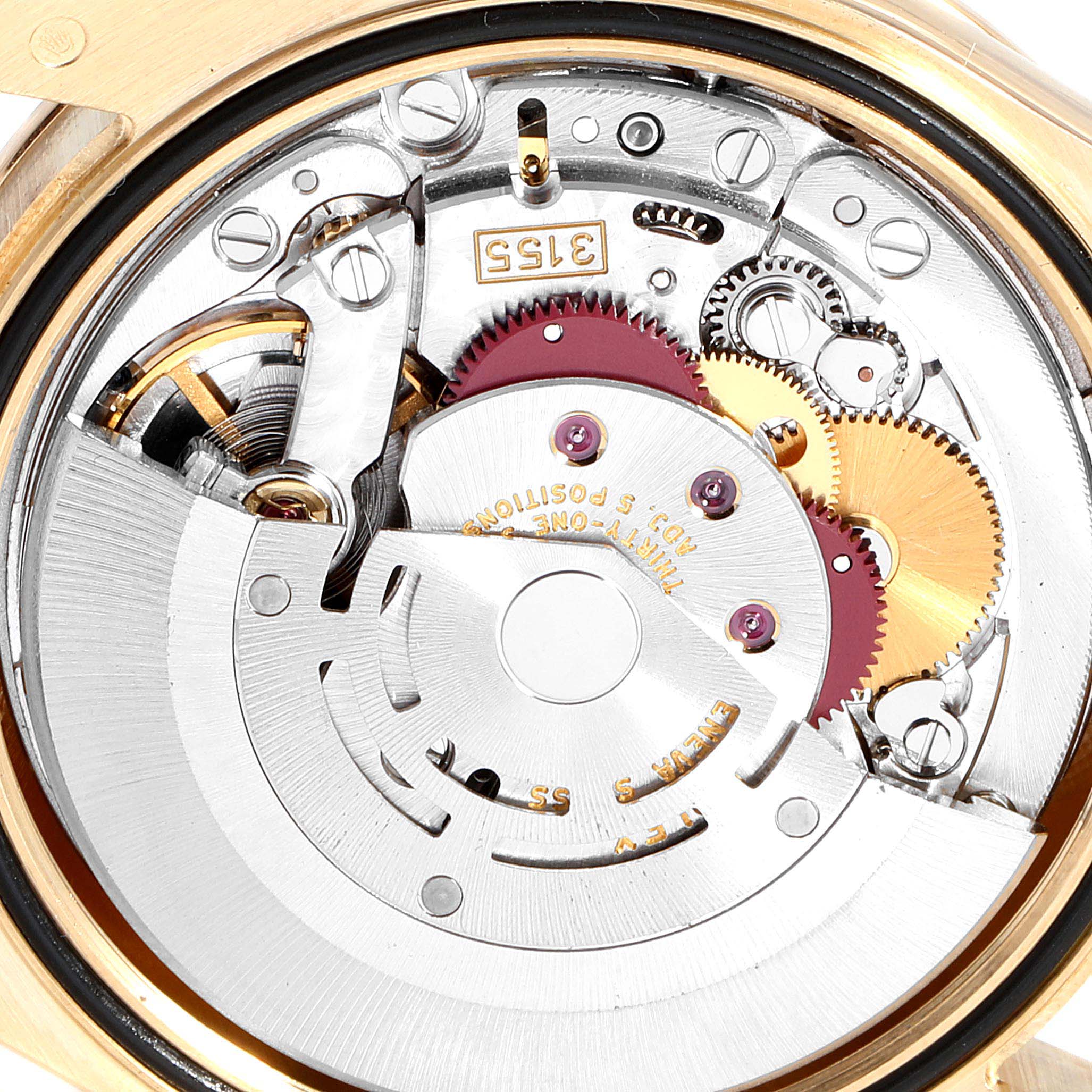 The image shows the internal mechanism of the Rolex President 118348 Men's Yellow Gold Green Dial 118348 Men's Yellow Gold Green Dial model watch viewed from the back, highlighting gears and components.