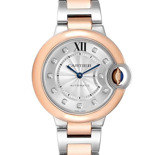 This image shows a front view of a Cartier Ballon Bleu WE902061 Women's Steel and Gold (two tone) Silver Dial WE902061 Women's Steel and Gold (two tone) Silver Dial watch, highlighting its dial, hands, and part of the bracelet.