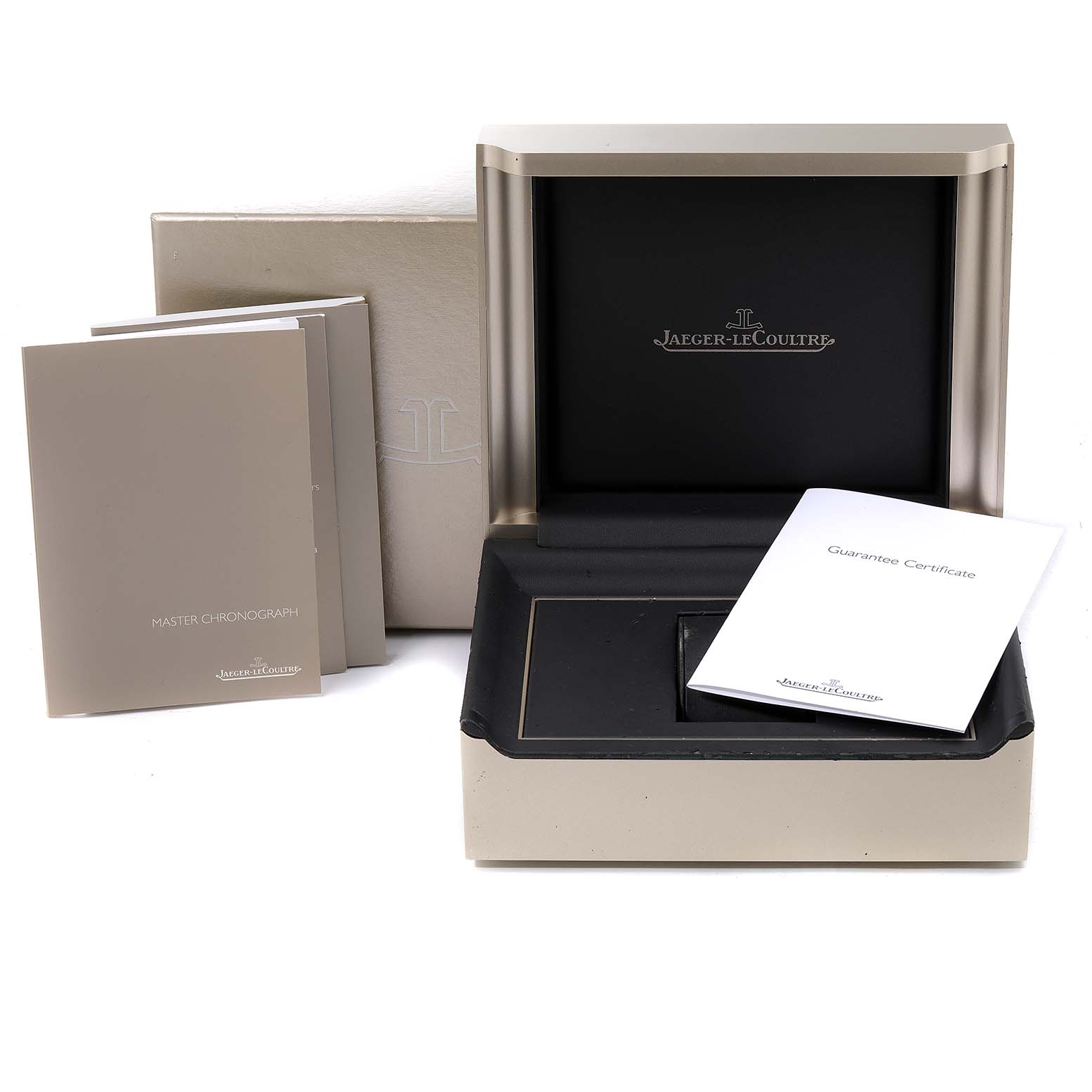 The image shows the packaging, manuals, and guarantee certificate for a Jaeger-LeCoultre Master watch model.
