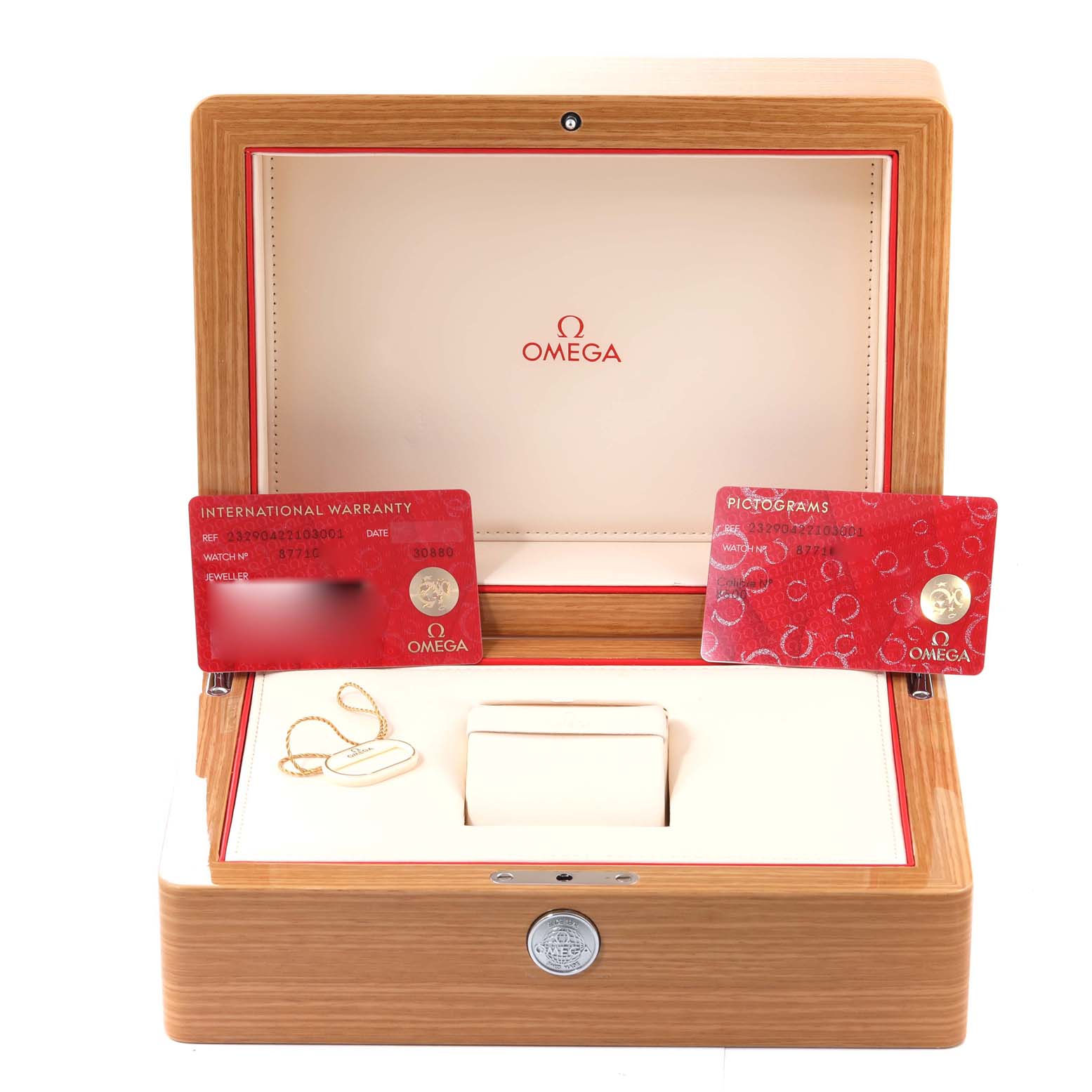 The photo shows an Omega Planet Ocean 232.90.42.21.03.001 Men's Titanium Blue Dial 232.90.42.21.03.001 Men's Titanium Blue Dial watch box, with warranty and pictogram cards, and a watch stand inside.