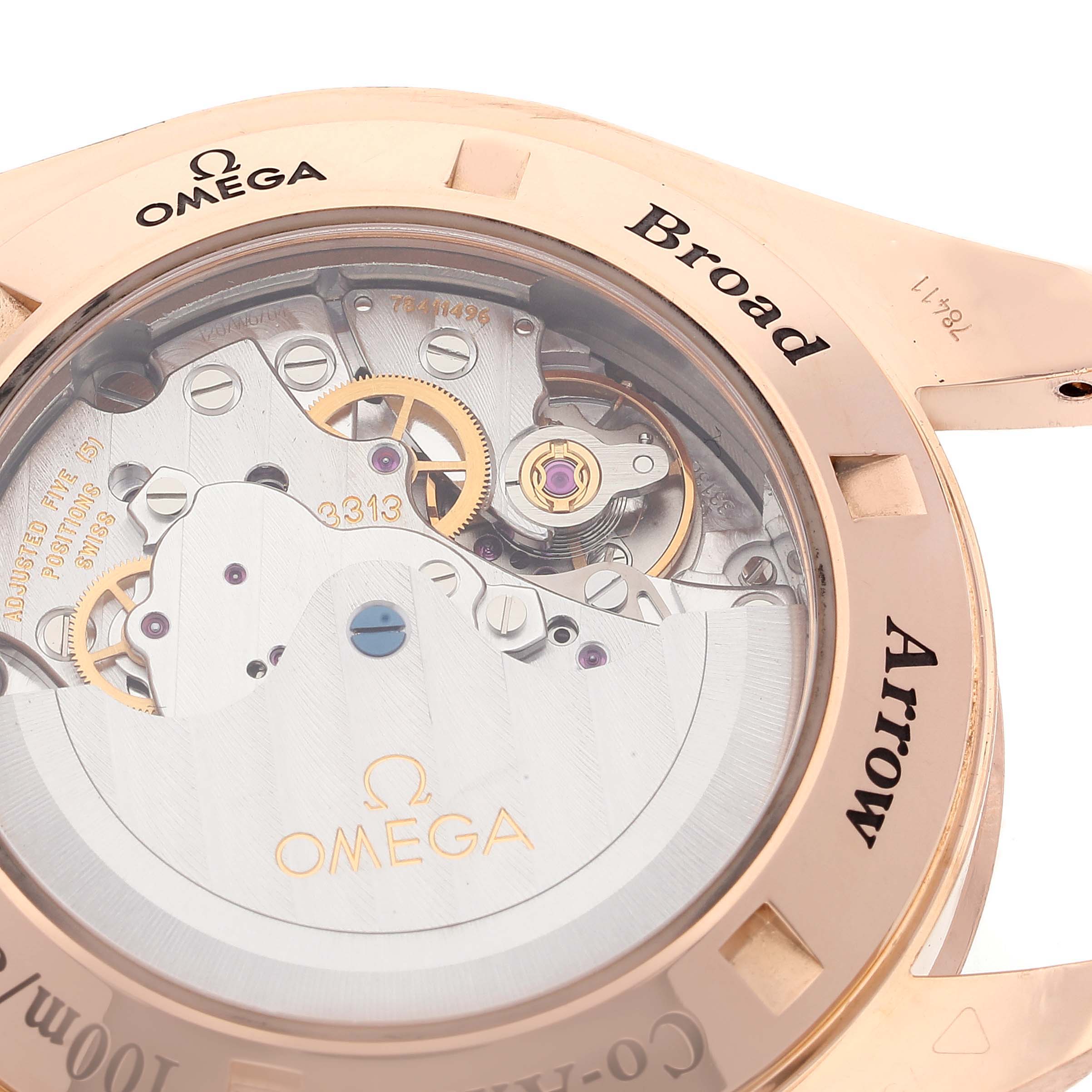 The image shows the back case and internal mechanical workings of an Omega Speedmaster 321.53.42.50.01.001 Men's Rose Gold Black Dial 321.53.42.50.01.001 Men's Rose Gold Black Dial Broad Arrow watch.