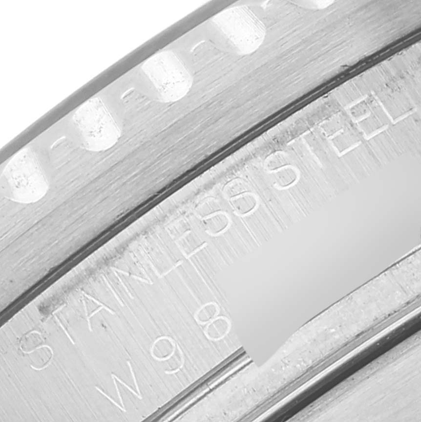 This close-up image shows a part of the bezel and the engraved text on the case of a Rolex Sea-Dweller 16600 Men's Stainless Steel Black Dial 16600 Men's Stainless Steel Black Dial watch.