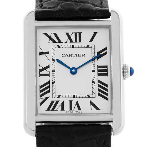 The image shows a front view of the Cartier Tank Solo W1018355 Stainless Steel Silver Dial W1018355 Stainless Steel Silver Dial watch, highlighting its Roman numeral dial, blue hands, and rectangular case.