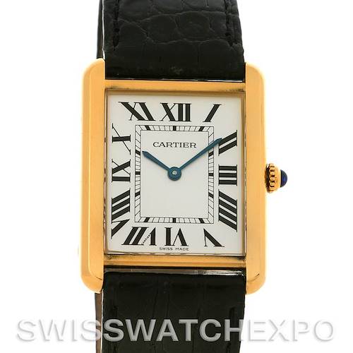 The Cartier Tank Solo W1018855 Men's Steel and Gold (two tone) Silver Dial W1018855 Men's Steel and Gold (two tone) Silver Dial watch is shown from a front angle displaying the face, leather strap, and crown with blue cabochon.