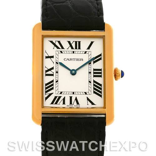 This image shows a full frontal view of a Cartier Tank Solo W1018855 Men's Steel and Gold (two tone) Silver Dial W1018855 Men's Steel and Gold (two tone) Silver Dial watch, featuring its dial, Roman numerals, and a portion of the black strap.