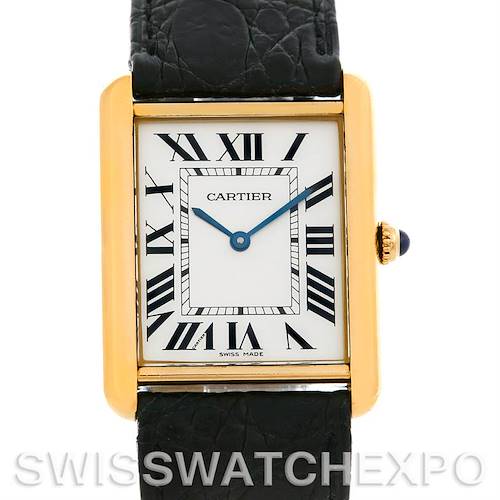 The image shows a Cartier Tank Solo W1018855 Men's Steel and Gold (two tone) Silver Dial W1018855 Men's Steel and Gold (two tone) Silver Dial watch face with Roman numerals, gold bezel, and black leather strap from a front angle.