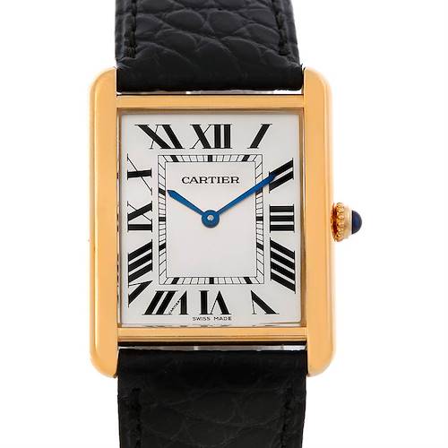 The Cartier Tank Solo W1018855 Men's Steel and Gold (two tone) Silver Dial W1018855 Men's Steel and Gold (two tone) Silver Dial watch is shown from a top-down angle, highlighting its face, gold rectangular case, black Roman numerals, and black strap.