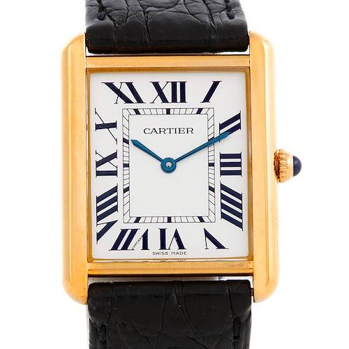 The image shows a Cartier Tank Solo W1018855 Men's Steel and Gold (two tone) Silver Dial W1018855 Men's Steel and Gold (two tone) Silver Dial watch from a front angle, displaying the face, case, crown, and part of the leather strap.