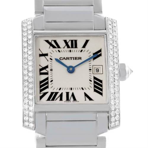 The image shows a frontal view of the Cartier Tank Française watch, highlighting its square face, Roman numerals, blue hands, and diamond accents.