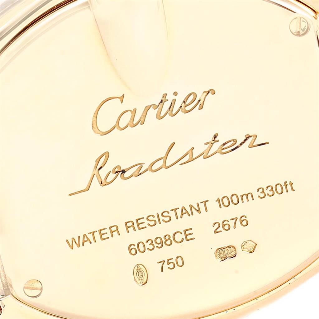 This image shows the engraved back case of a Cartier Roadster W62018Y5 Women's Yellow Gold Silver Dial W62018Y5 Women's Yellow Gold Silver Dial watch at a close angle.