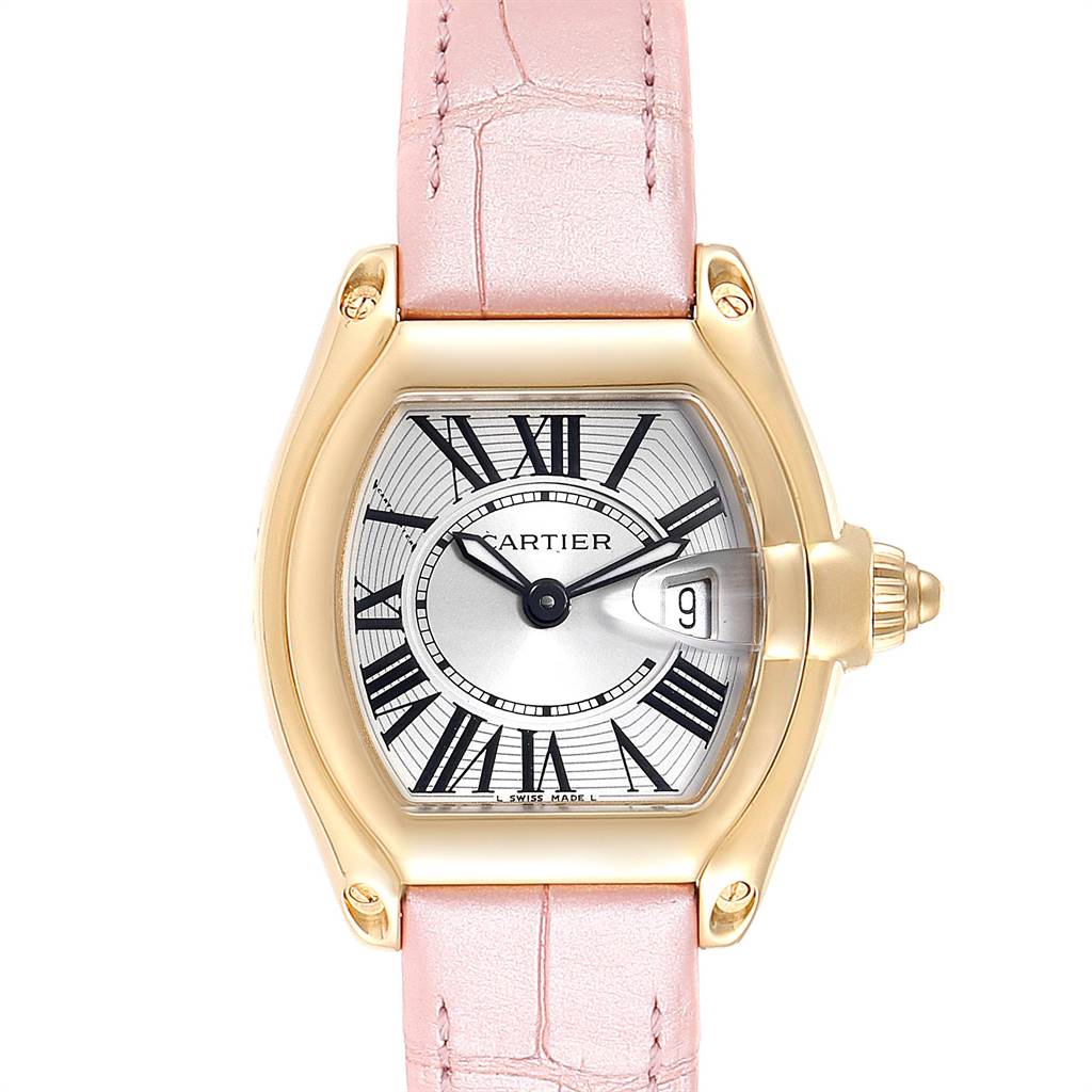 The Cartier Roadster W62018Y5 Women's Yellow Gold Silver Dial W62018Y5 Women's Yellow Gold Silver Dial watch is shown from a front angle, displaying its face, dial, case, and pink strap.