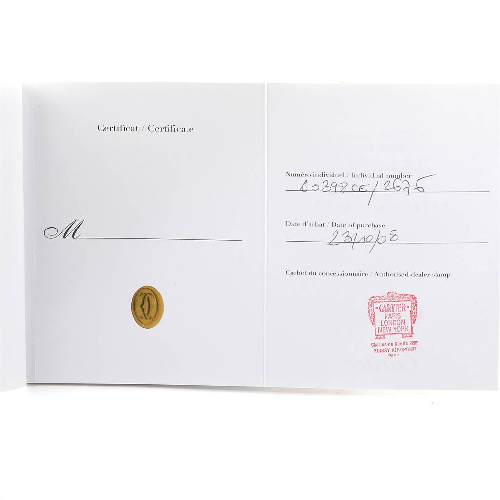 The image shows the certificate paperwork for a Cartier Roadster W62018Y5 Women's Yellow Gold Silver Dial W62018Y5 Women's Yellow Gold Silver Dial watch, displaying the purchase date and dealer stamp.