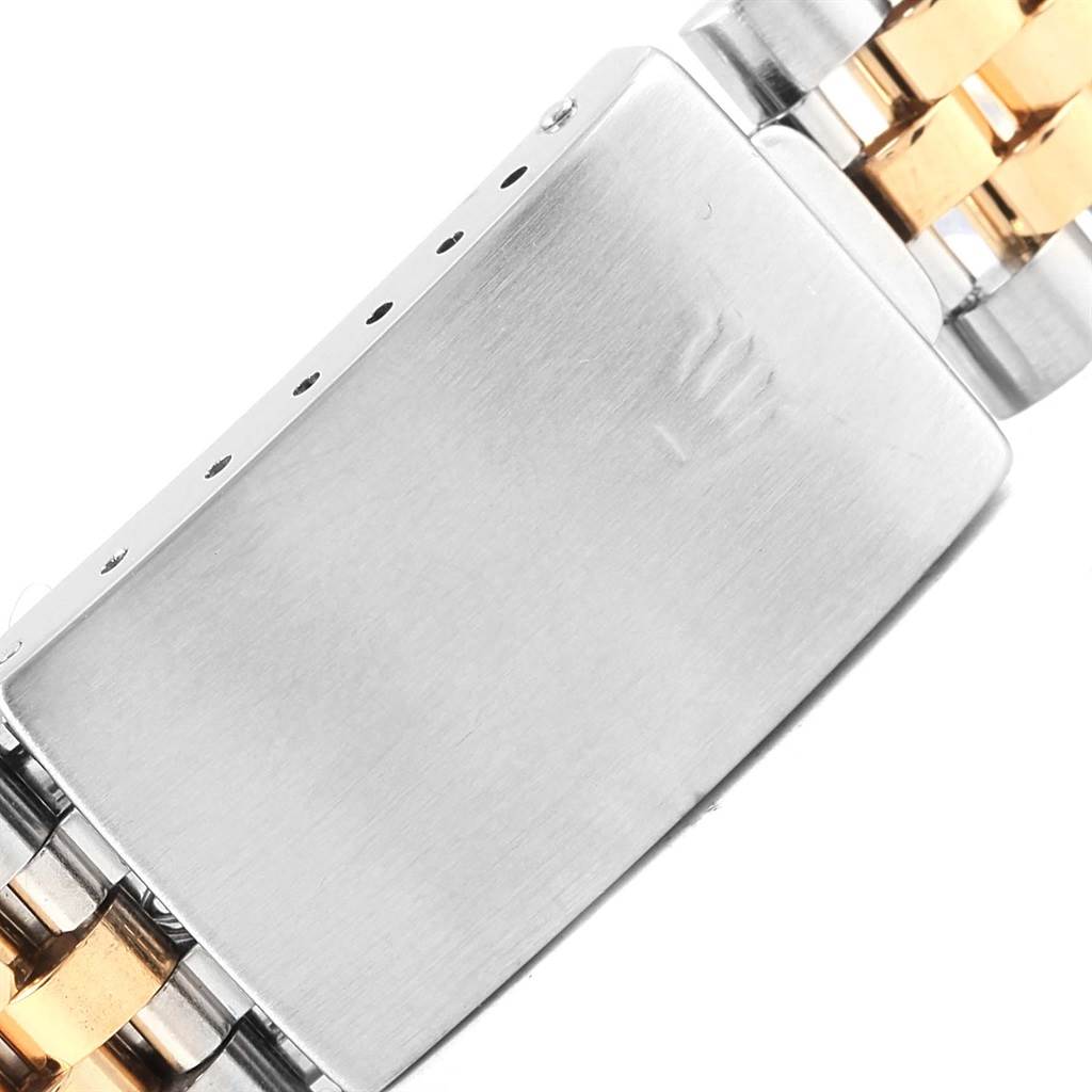This image shows a close-up of the clasp and bracelet of the Rolex Turn-o-Graph 16263 Men's Steel and Gold (two tone) Beige Dial 16263 Men's Steel and Gold (two tone) Beige Dial watch.