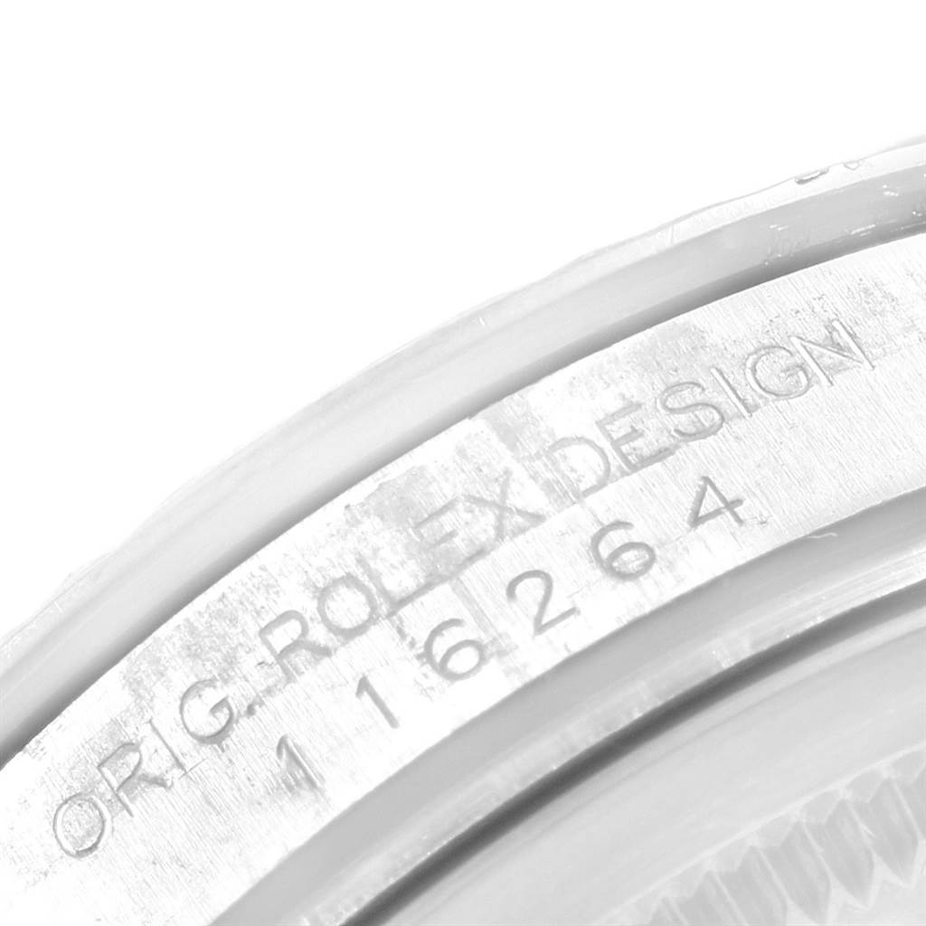 The image shows a close-up of the case side engraving of a Rolex Turn-o-Graph 116264 Men's Stainless Steel Black Dial 116264 Men's Stainless Steel Black Dial model.
