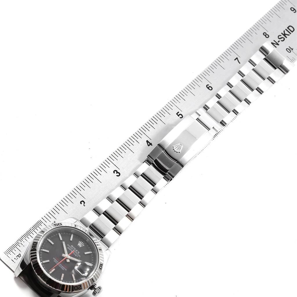 The image shows a Rolex Turn-o-Graph 116264 Men's Stainless Steel Black Dial 116264 Men's Stainless Steel Black Dial watch laid flat beside a ruler, displaying its face, bezel, bracelet, and clasp.